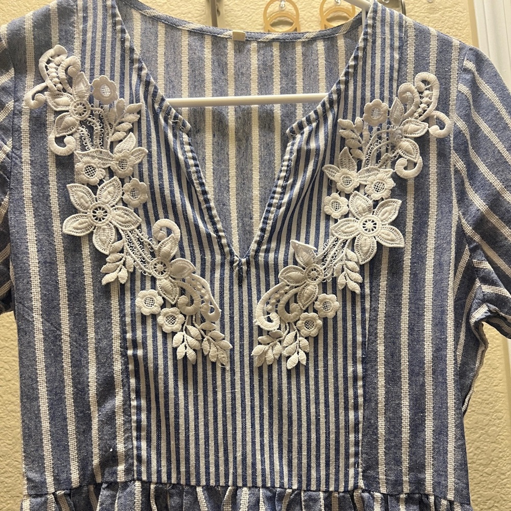 Embroidered flowers with blue and white striped dress